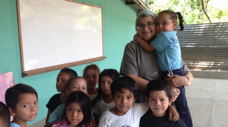 Sister Ondina with children from one of the early childhood centers in the “bordos”(shanty towns) of San Pedro Sula, Honduras.